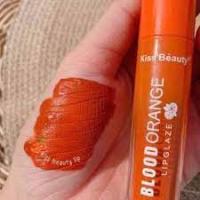 Orange blood lipstick from Kiss Beauty